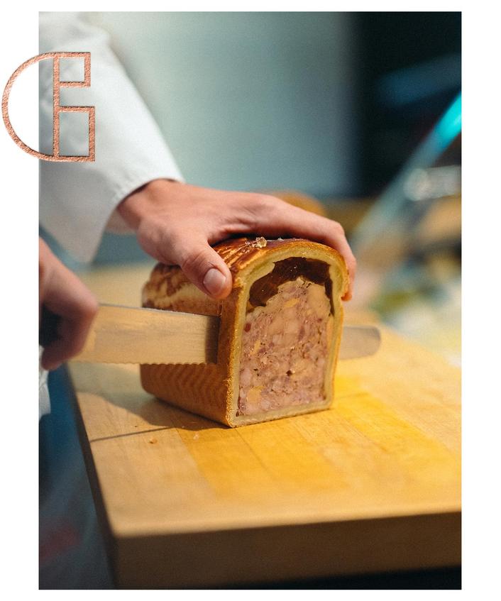 Chef cutting the foie gras pâté en croute from Maison Vérot